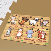 Child playing with a wooden animal puzzle board on a white surface