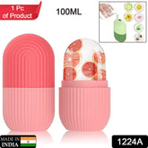 Two pink silicone ice rollers, one open with grapefruit slices inside, the other closed, on a white surface.