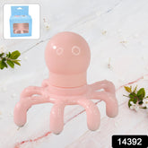 Pink octopus-shaped head massager with a small blue box in the corner, on a marble surface with white flowers.