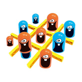 Top down view of Gobble Game with colorful pieces on blue board