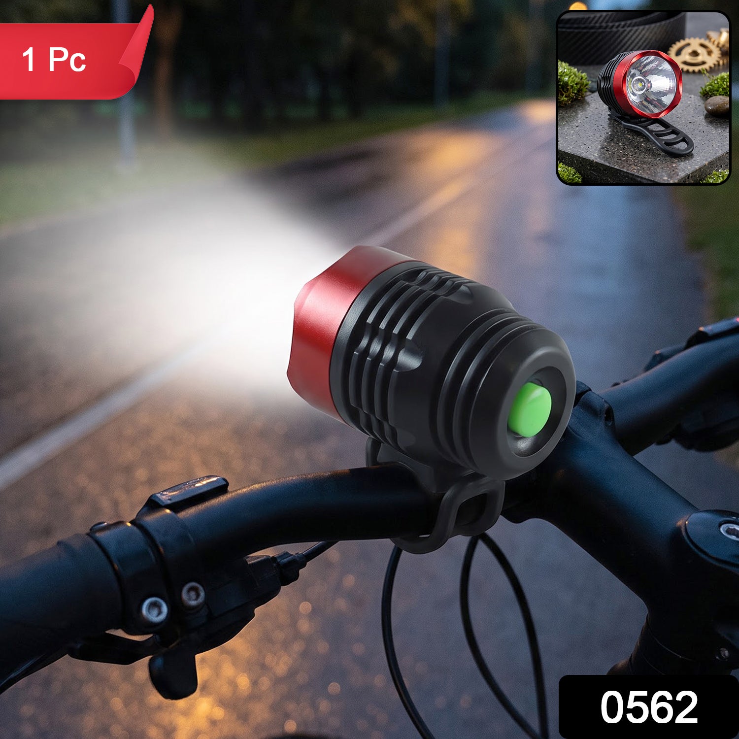 A red and black bicycle headlight with a green button illuminates a dark road, mounted on handlebars.