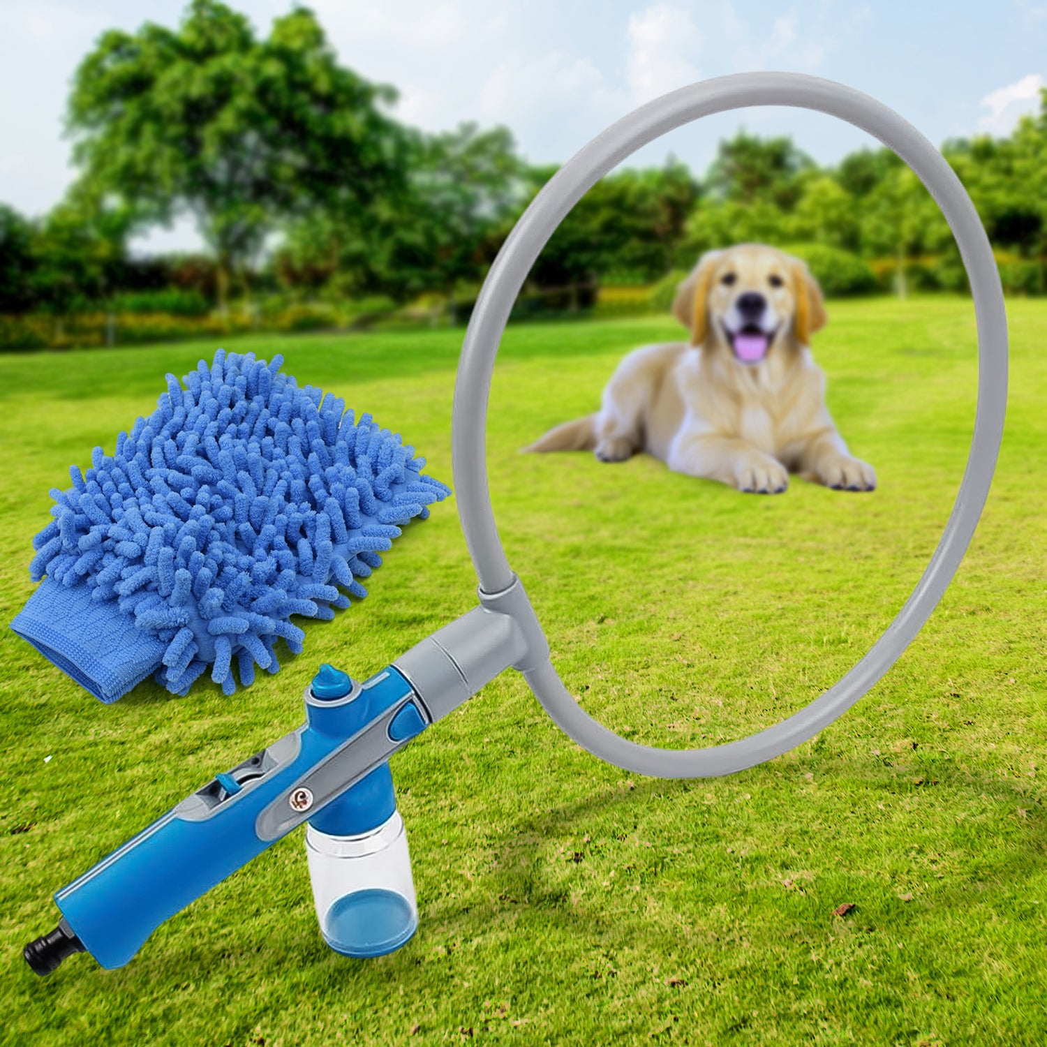 A blue and gray pet shower sprayer with a circular ring and a blue microfiber grooming glove on green grass. A golden