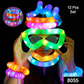A person wears glowing pop tube glasses, a necklace, and bracelets, all illuminated in vibrant colors against a dark