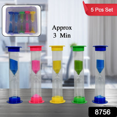 Five colorful plastic sand timers with blue, pink, yellow, and green caps and sand, displayed on a wooden surface.