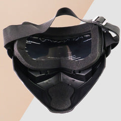 Rear view of the black motorcycle goggles and face mask, showing the foam padding and adjustable strap.