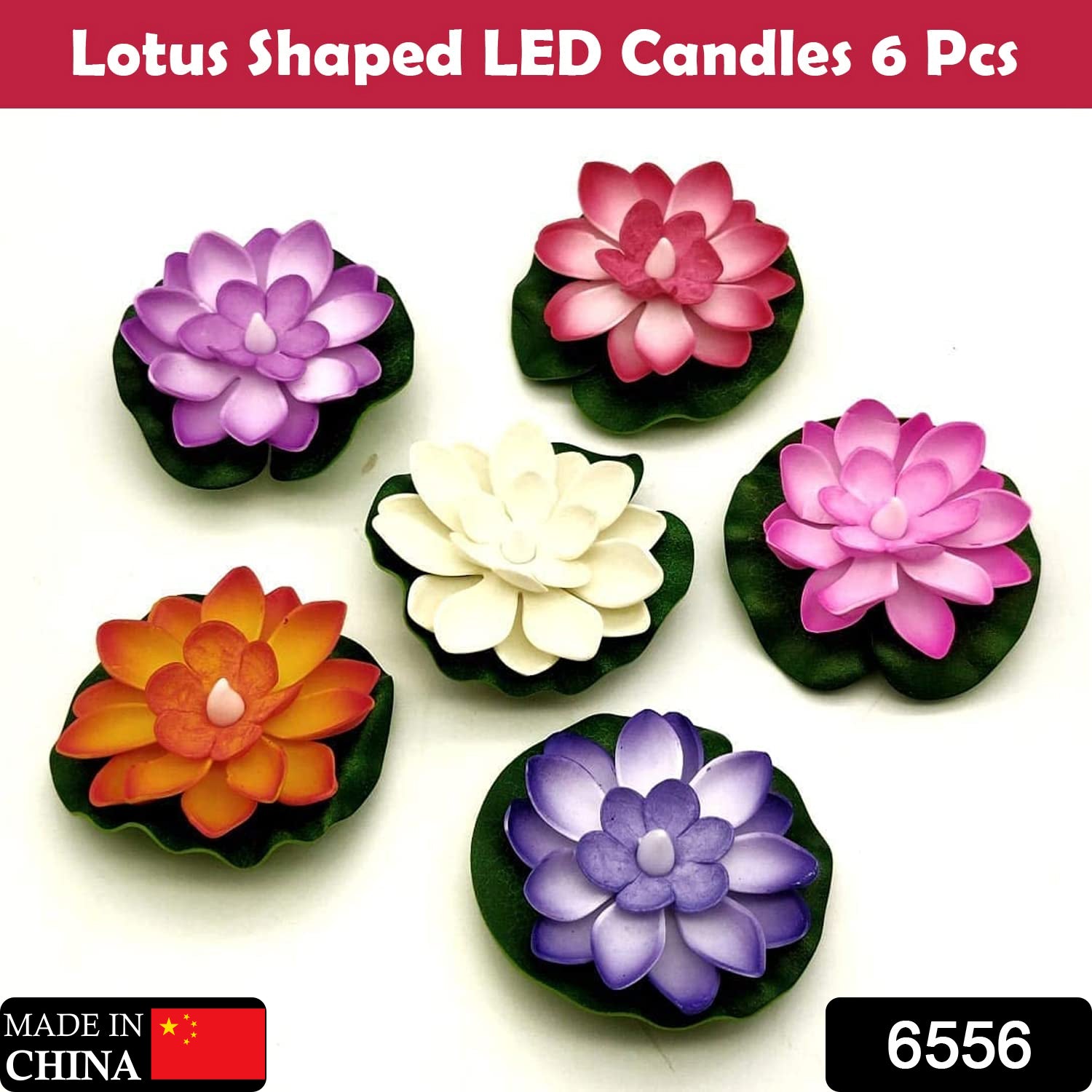Six artificial lotus flower candles in various colors, each with a green leaf base, arranged on a white surface.