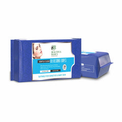 Two blue packages of Beautiful Basics Refreshing Wipes, one slightly behind the other on a white surface.