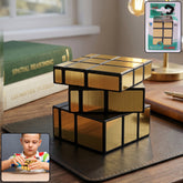 Gold mirror puzzle cube on a dark background