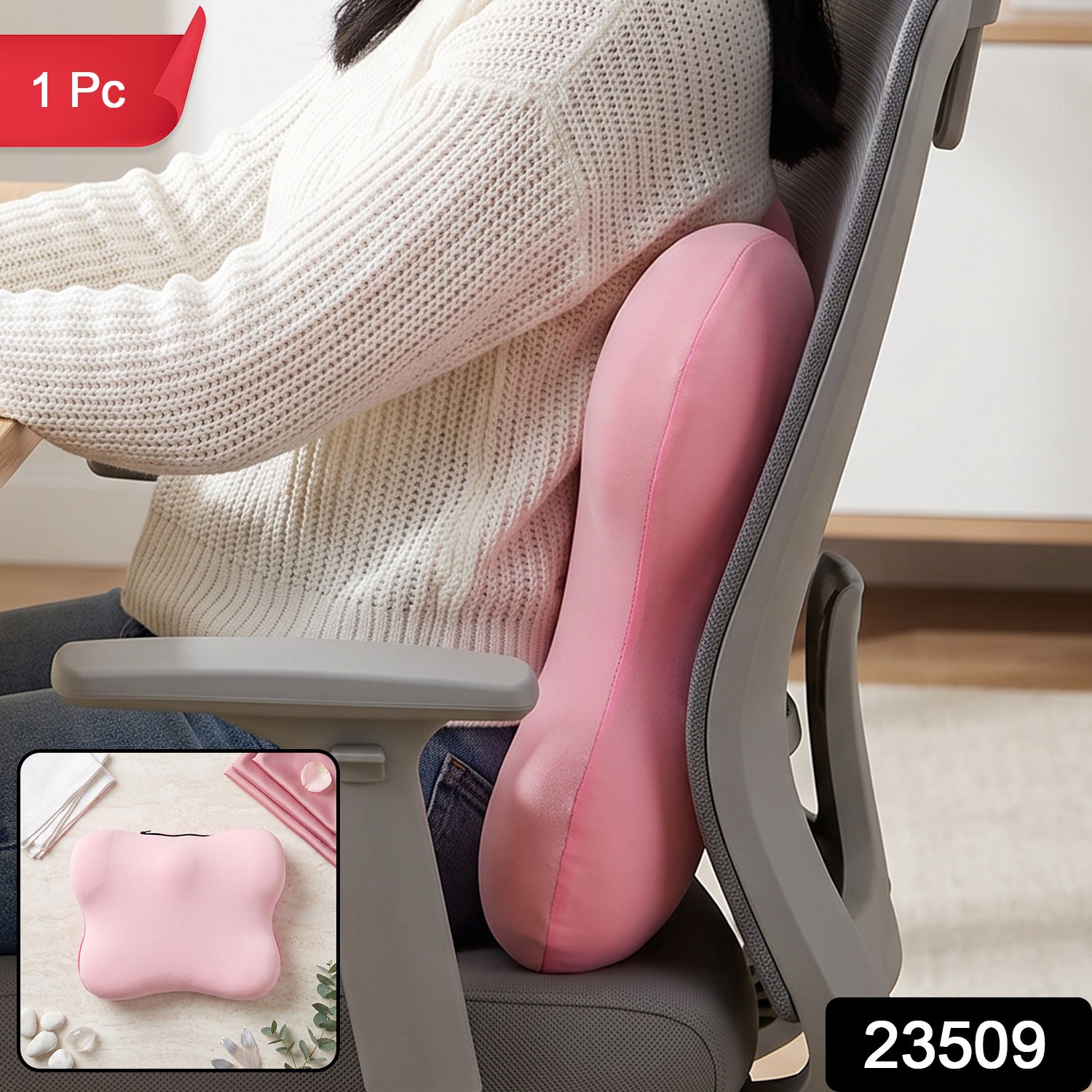 A person sitting in a gray office chair with a pink lumbar support cushion behind their lower back.