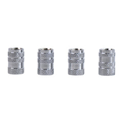 Four identical silver metal valve caps with textured surfaces are arranged in a row.