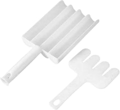 A white plastic four-chambered sausage maker and a matching four-pronged rake are displayed together.