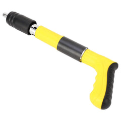 A yellow and black manual nail gun tool with a silver tip is angled on a white background.