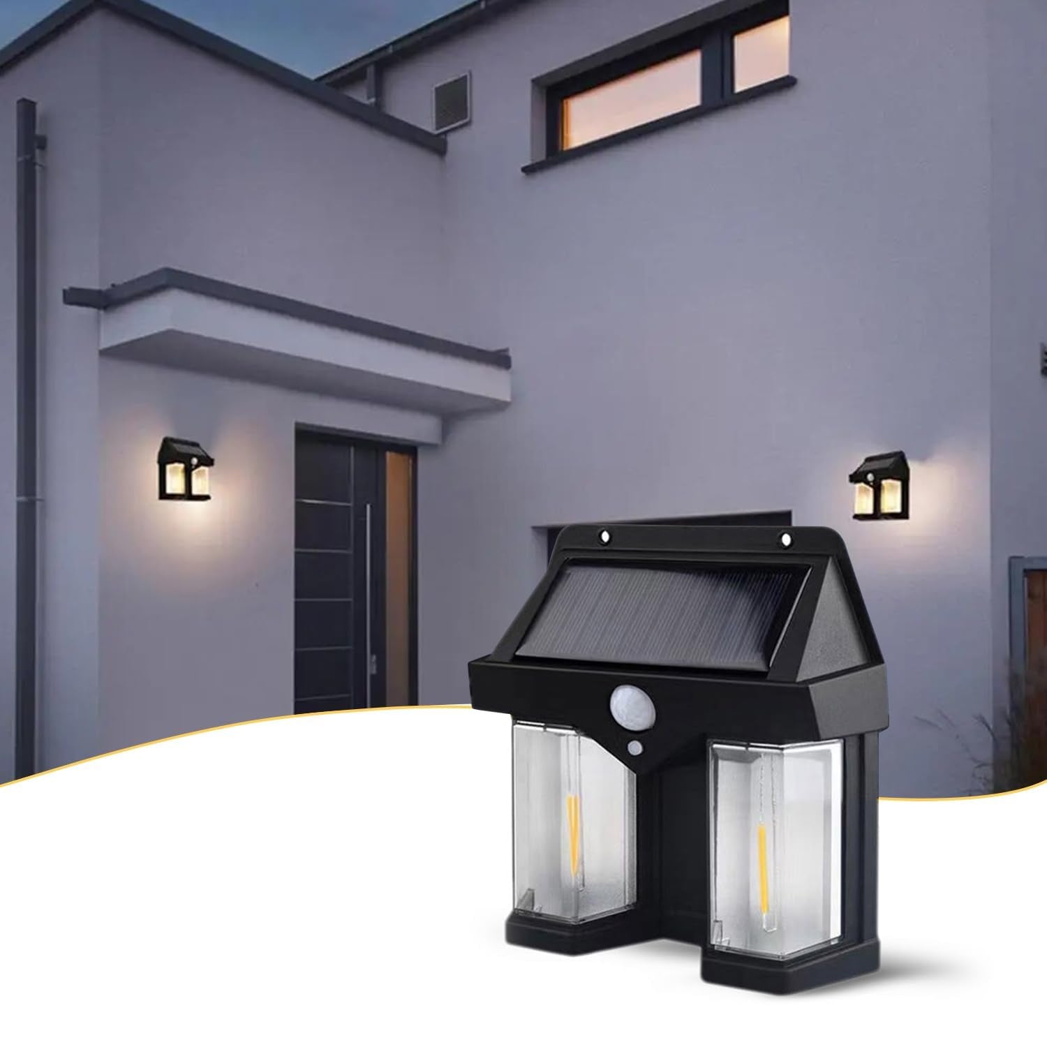 A black solar wall lamp with two clear light panels illuminates a modern grey house exterior at dusk.