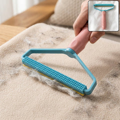 Close-up view of the blue and yellow textured lint remover head, with text indicating its function for pet hair.