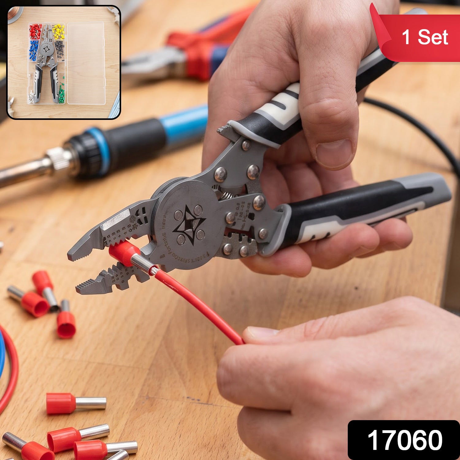 A person's hands using a gray and black crimping tool on a red insulated wire end, with other connectors nearby.