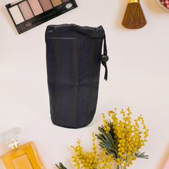 A black drawstring pouch with a checkered stripe pattern and a cord lock stands on a plain white background.
