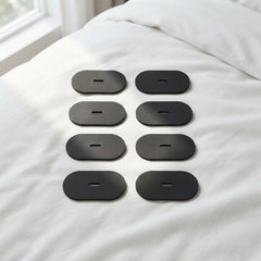 A stack of black oval mouth tapes and eight individual tapes are displayed on a white background.