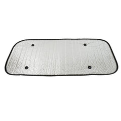 A silver car sunshade with a textured surface, black border, and four suction cups, laid out flat on a white surface.