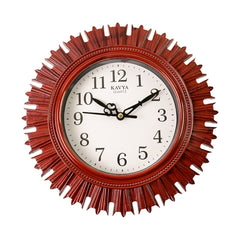 Front view of a red sunburst wall clock with a white dial and black numerals, isolated on a white background.