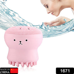 A pink octopus-shaped silicone facial cleansing brush with a cute face and a woman washing her face in the background.