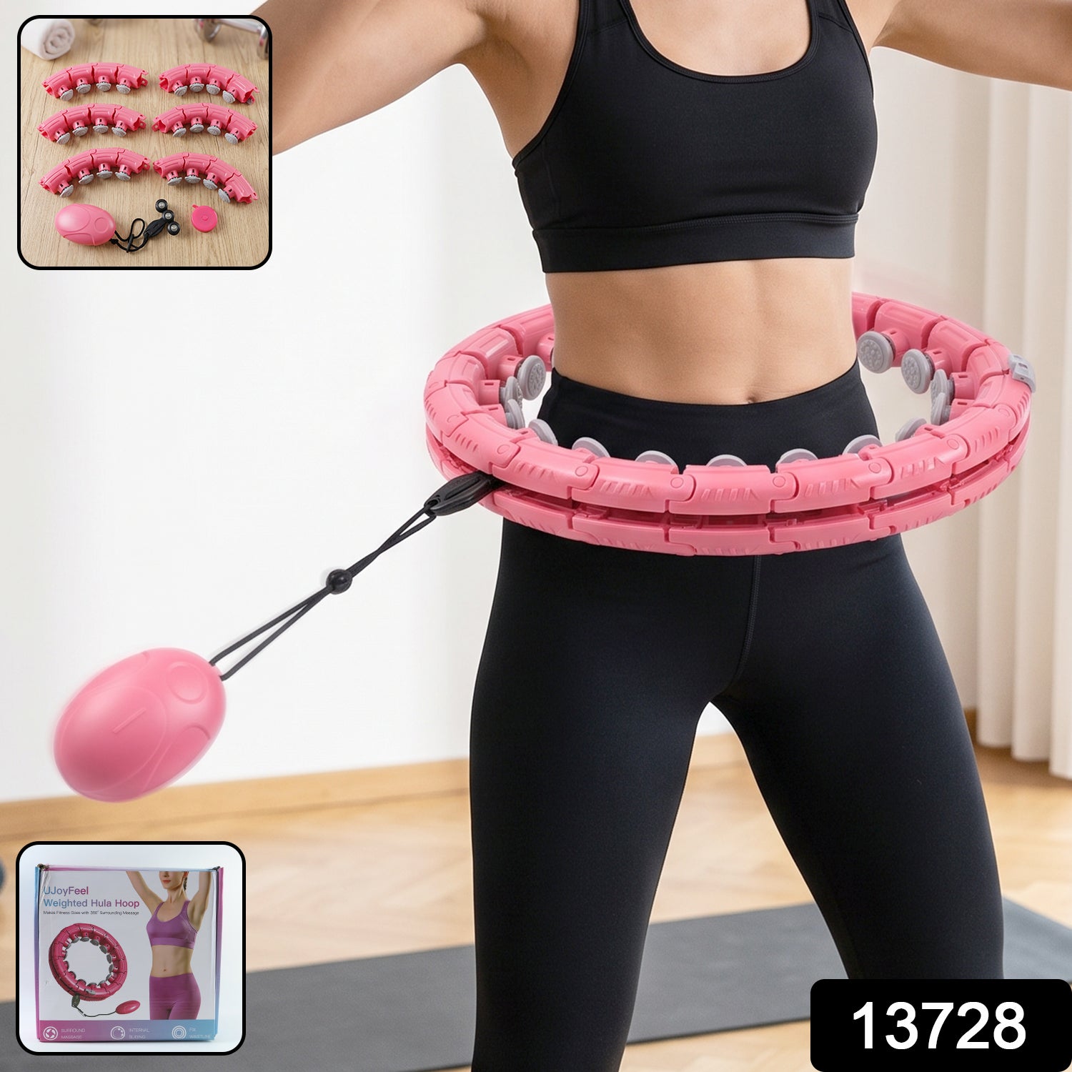 A woman in black activewear uses a pink weighted hula hoop with an attached oval massage ball.