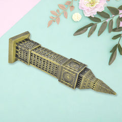A full frontal view of the bronze Big Ben clock tower replica, featuring a white clock face with Roman numerals, is
