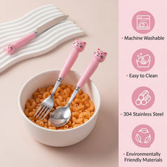 A white bowl of macaroni with a pink cat-themed fork and spoon, and a knife in the background.