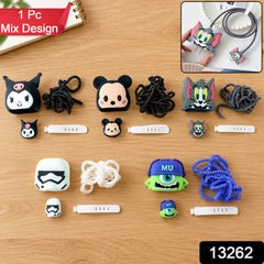 Assortment of six cartoon character charger covers, cable protectors, and cable ties on a wooden surface.