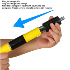 A person's hands demonstrate how to remove residue from the black and yellow manual nail gun tool.