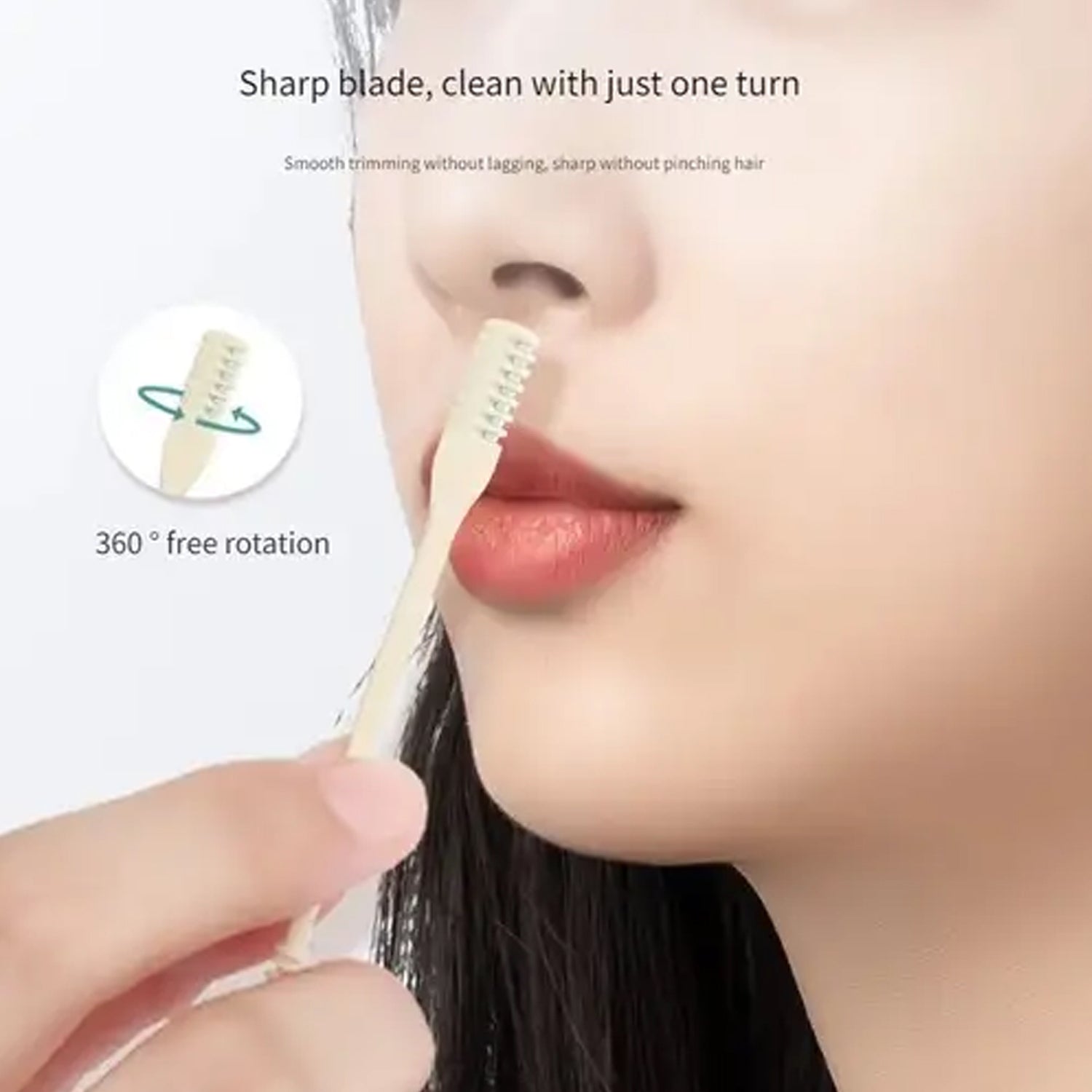 A woman's face with a beige nose hair trimmer inserted into her nostril, demonstrating 360-degree rotation.