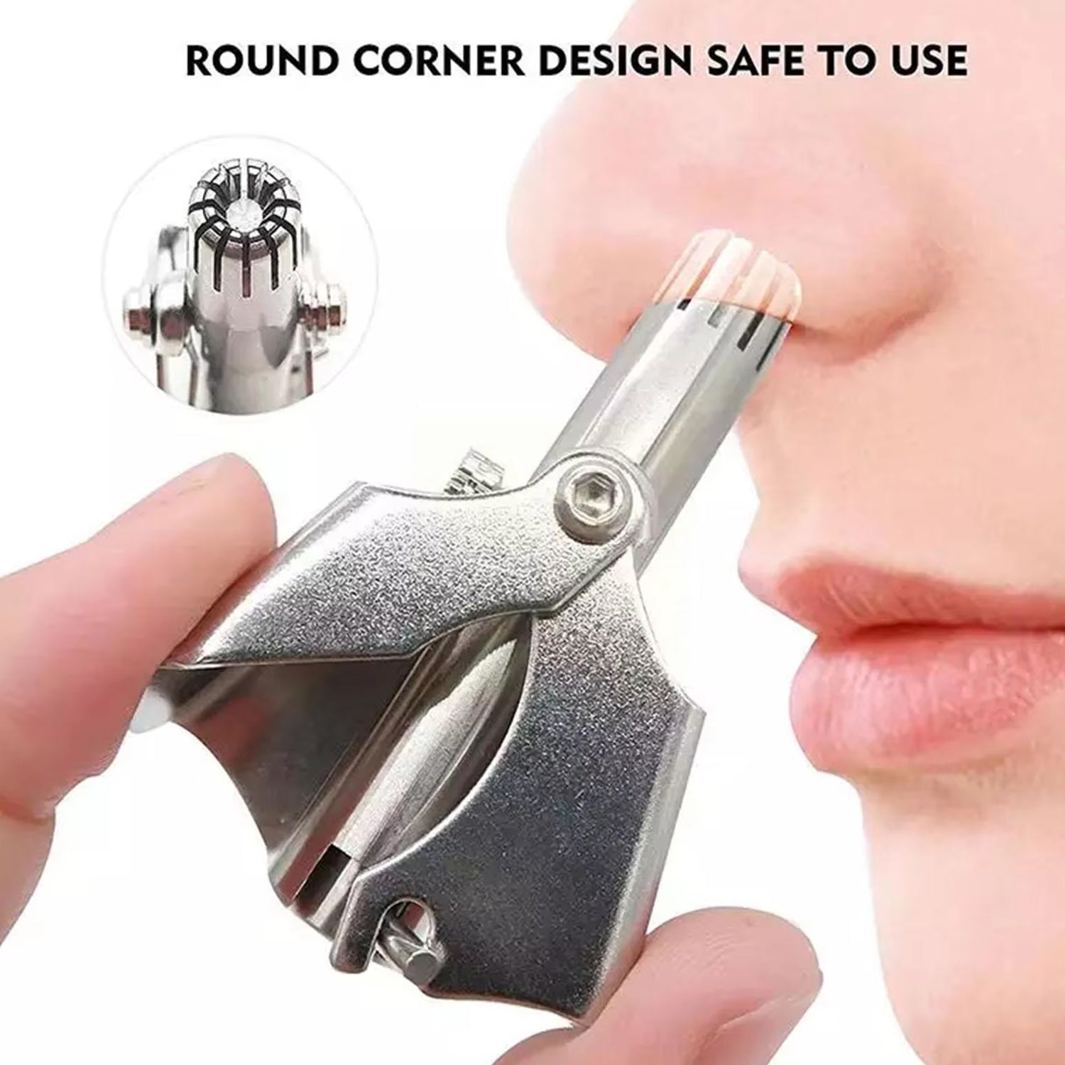 A hand holds the silver manual nose hair trimmer to a nose, emphasizing its safe round corner design.