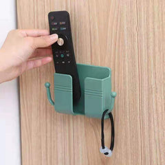 Compact wallmount mobile stand with integrated hook, holding a smartphone and keys.