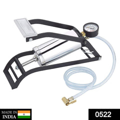 A black and silver foot pump with a pressure gauge and a clear hose is displayed on a white background.