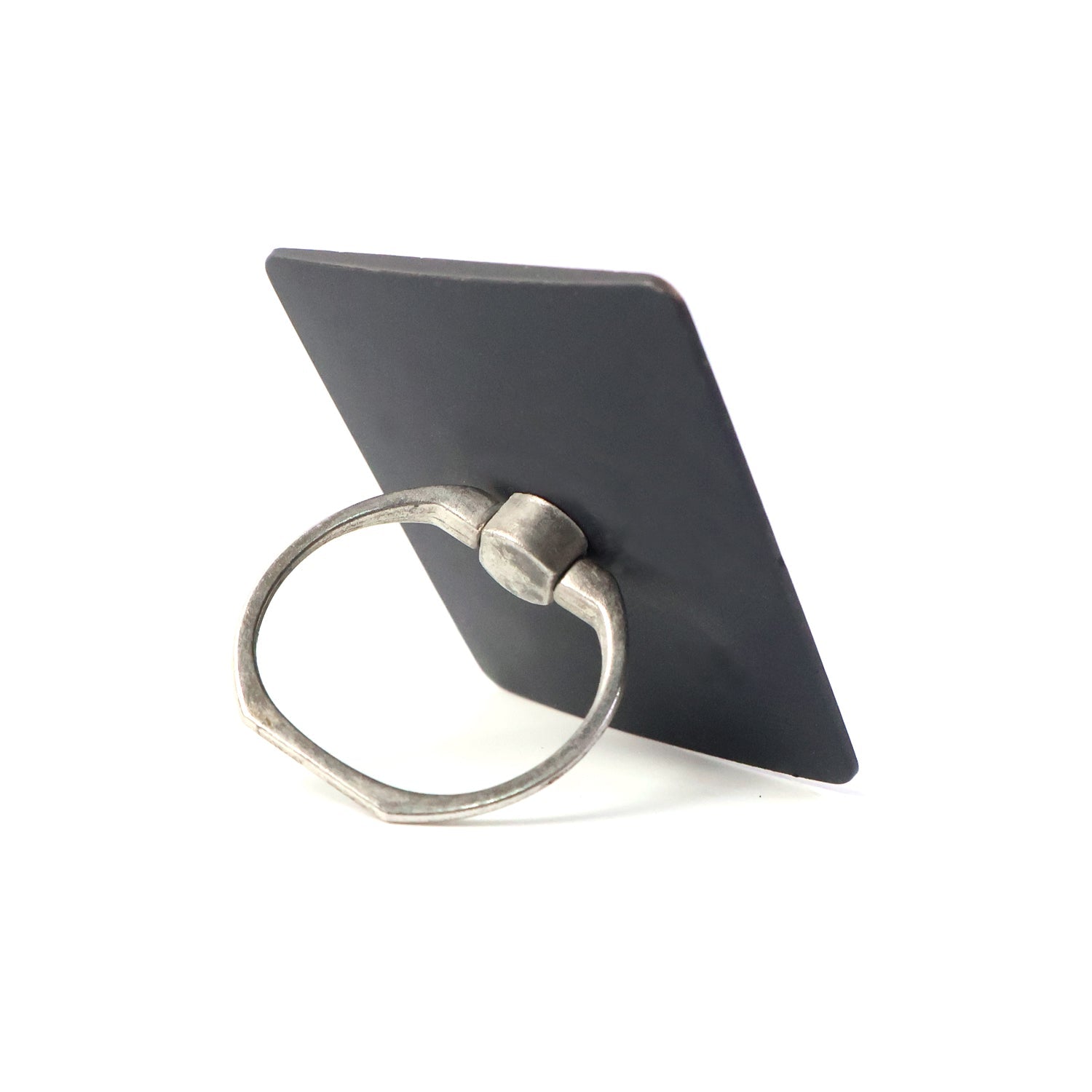 A black square phone ring stand with a silver ring, viewed from an angle, on a white background.