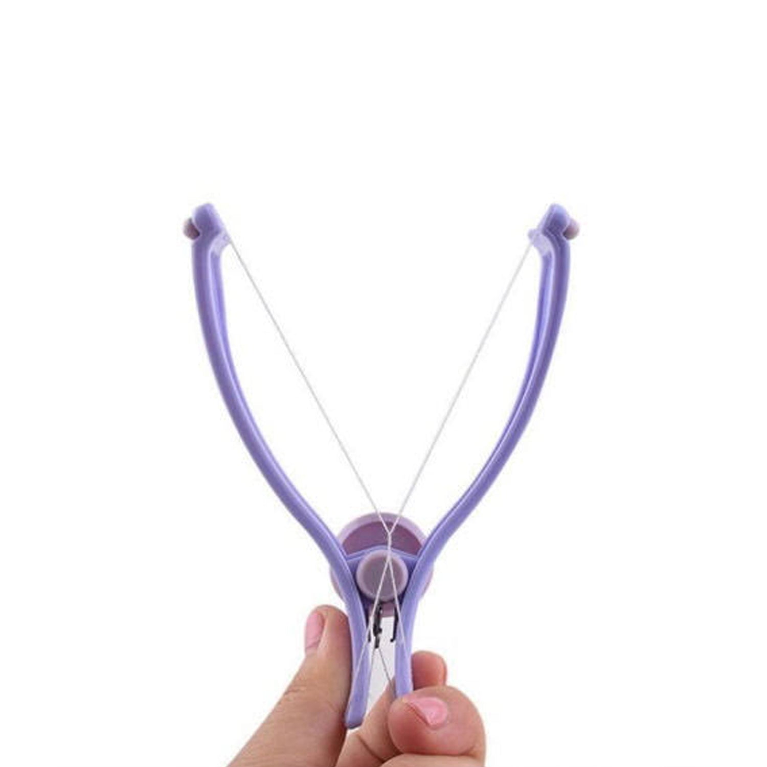 A hand holding a purple hair threading tool with white thread stretched between its arms.