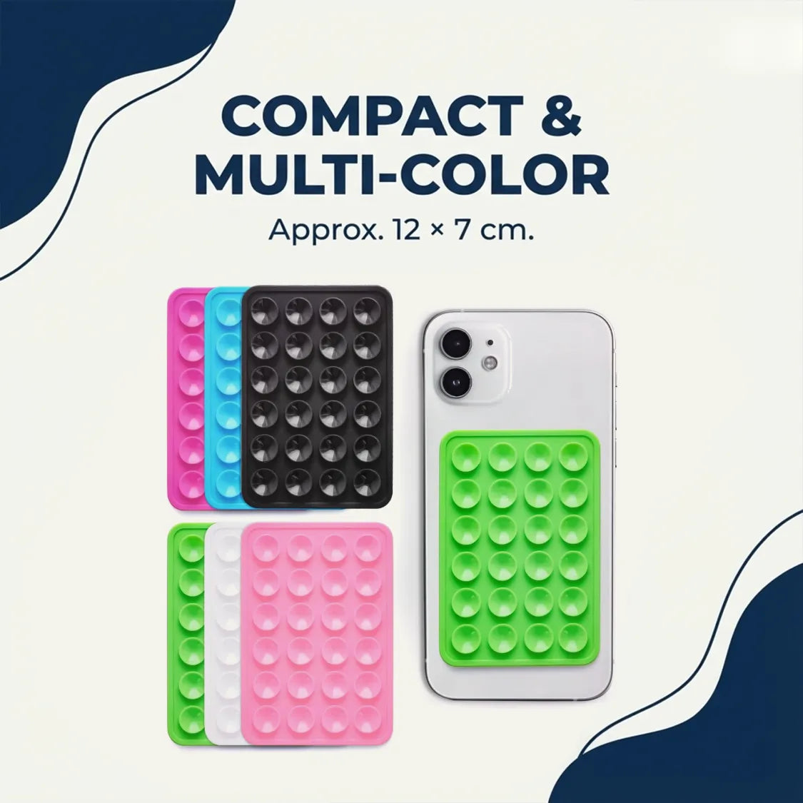 A grey phone with a green silicone suction holder, alongside multiple colored suction holders.