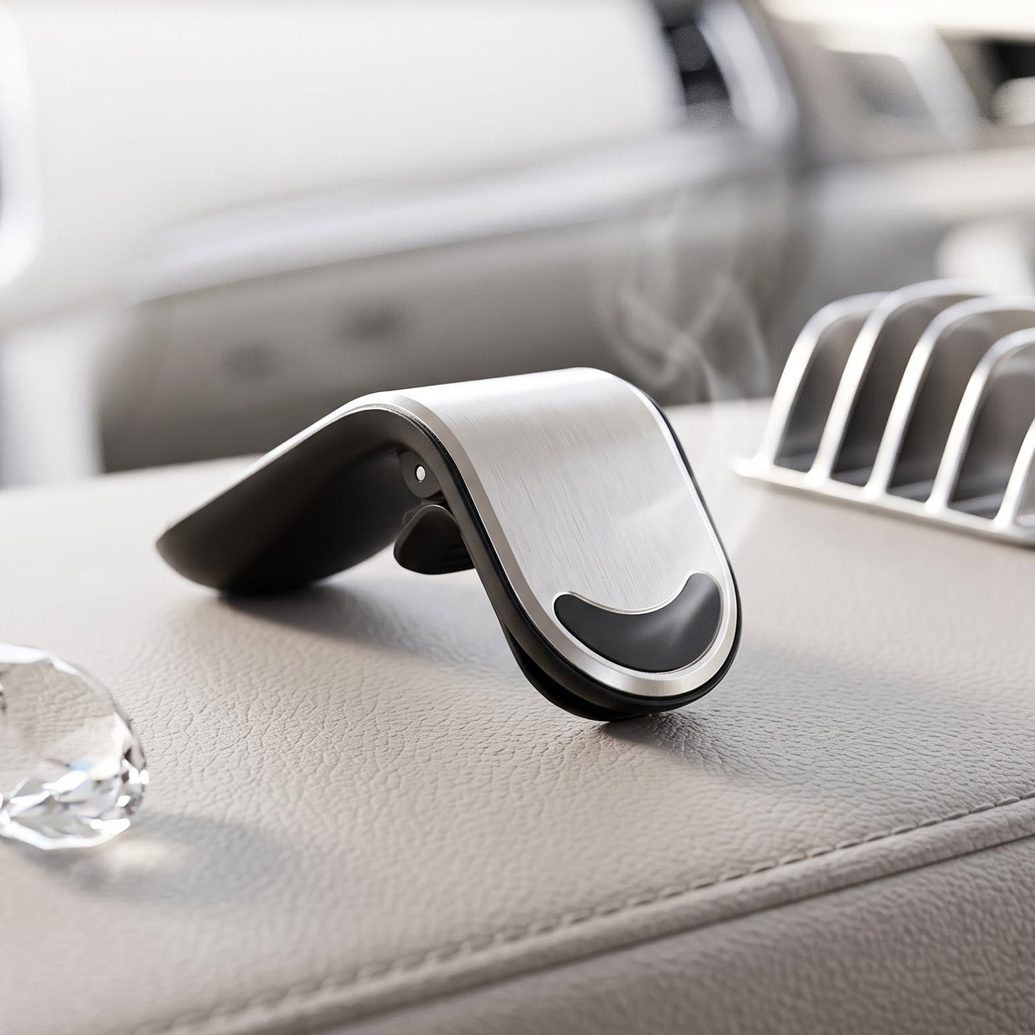 A hand holds a smartphone displaying a map application, attached to the car air vent holder.