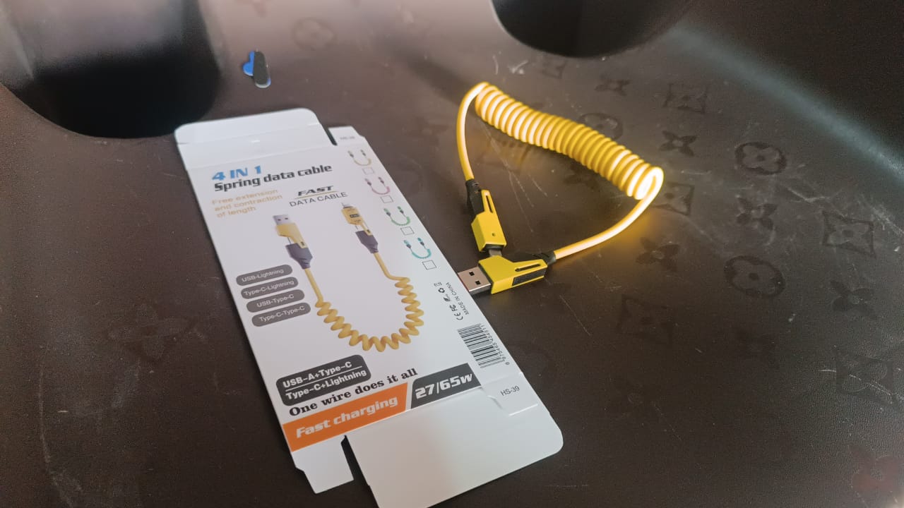 Charging multiple devices with 4-in-1 spring fast charging cable