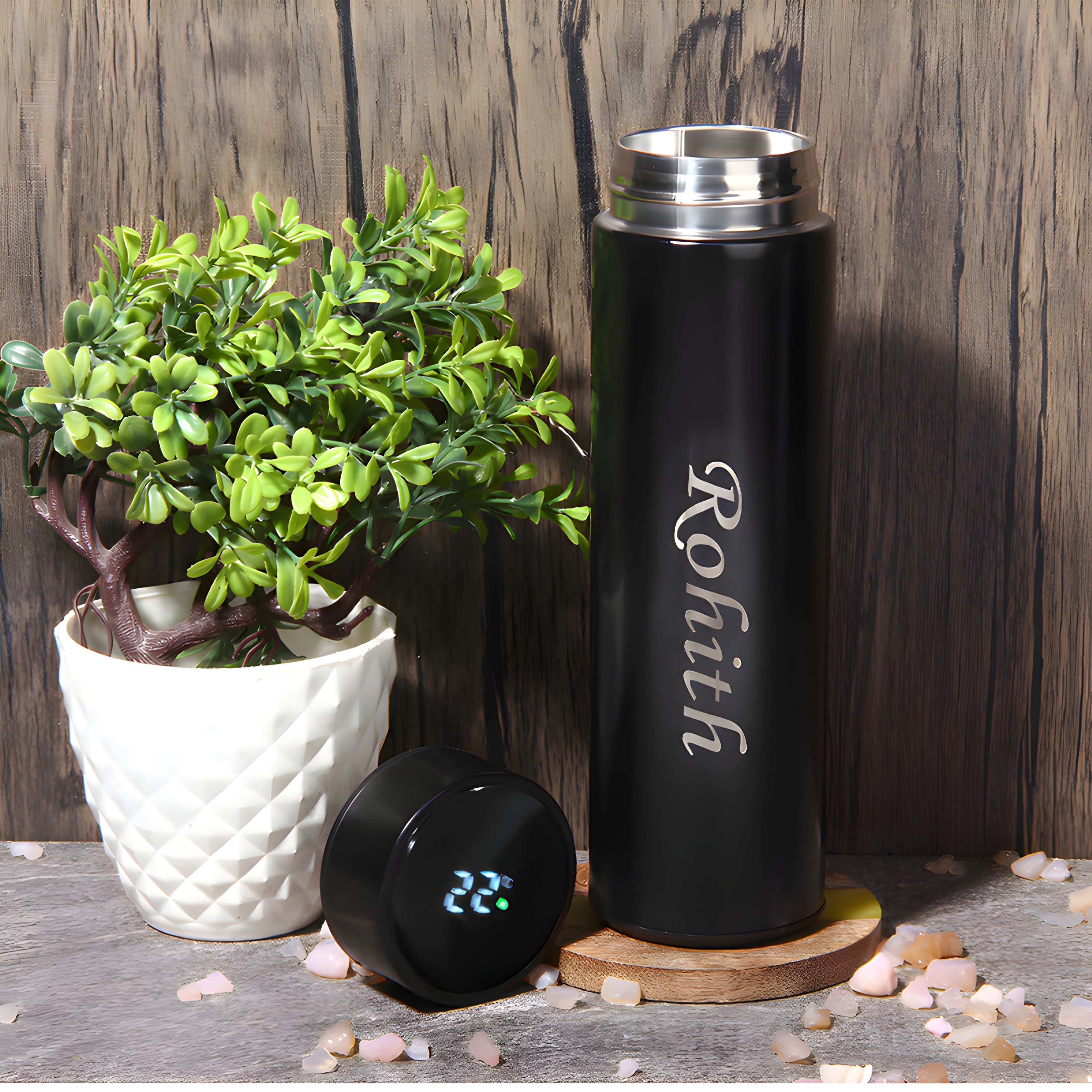 Close-up of the smart LCD temperature display on the customizable water bottle cap.