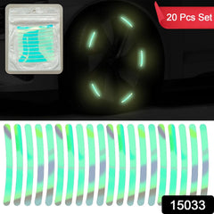 A package of 20 reflective stickers and a dark car wheel with glowing green stickers on the rim.