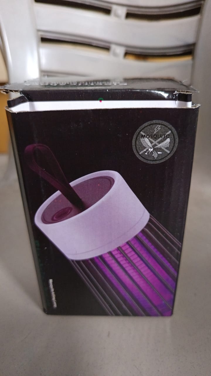 A dark product box for a Mosquito Killer Lamp, featuring an image of the lamp with purple light, is shown partially open.