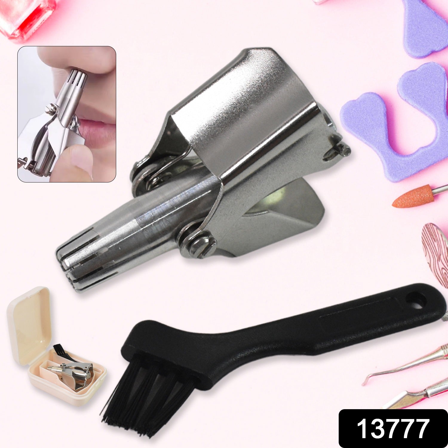 A silver manual nose hair trimmer and a black cleaning brush are displayed against a pink background with nail tools.