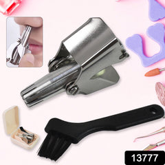 A silver manual nose hair trimmer and a black cleaning brush are displayed against a pink background with nail tools.