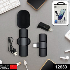User demonstrating the small size of the Type-C and iPhone compatible microphone.