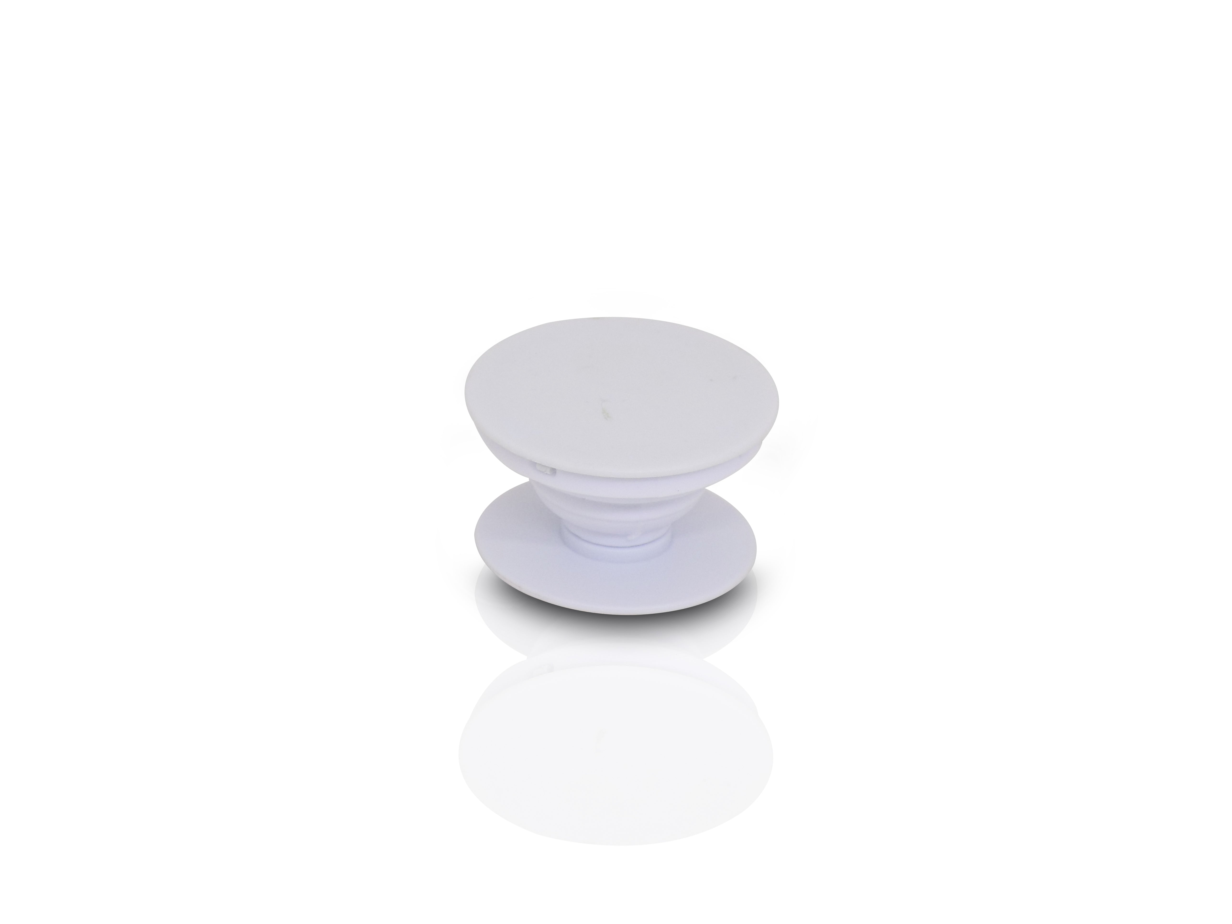 A single white phone grip is shown in its expanded state on a reflective white surface.