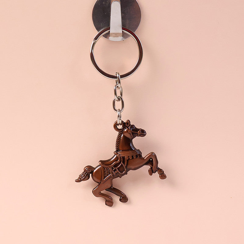 Side view of stylish metal horse design keychain