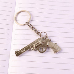Close-up of the gun shape metal keychain showcasing its intricate design details.
