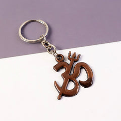 Front view of Om Trishul metal spiritual keychain accessory