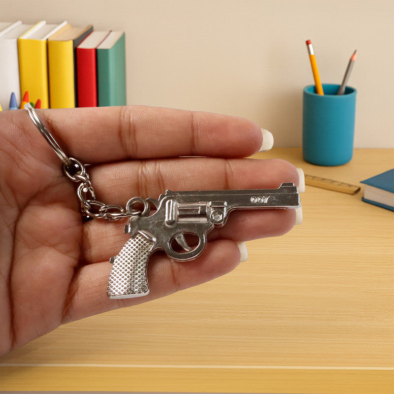 Top view of the sleek and durable gun shape metal keychain accessory.