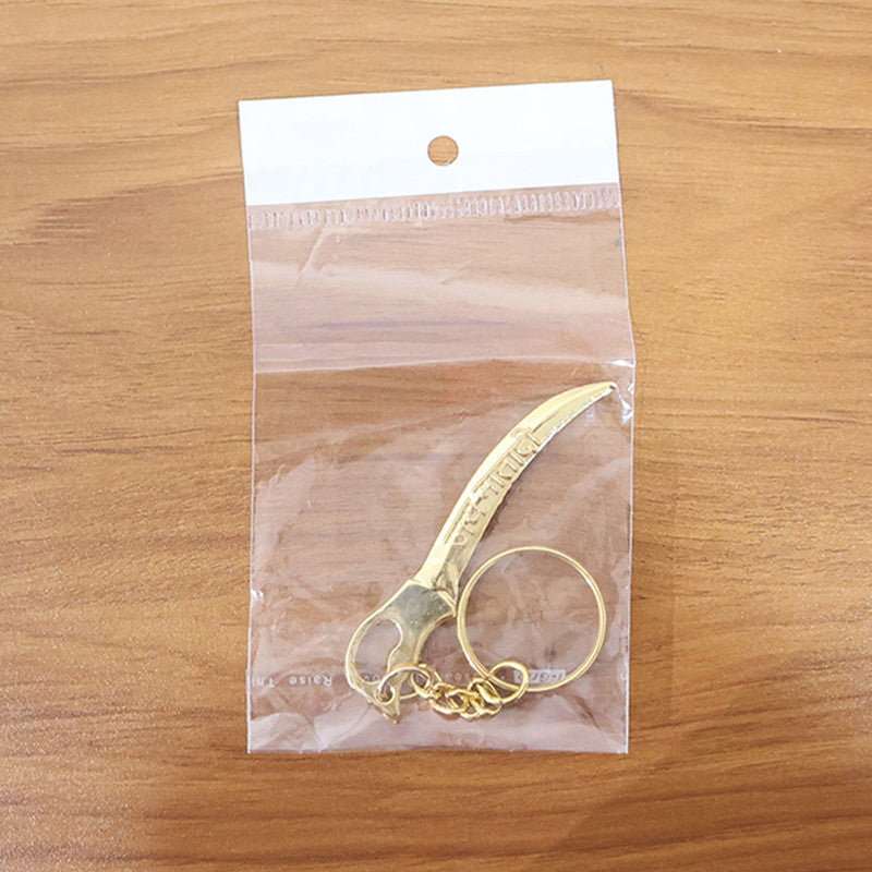 Back view of metal golden Mataji sword style keychain accessory